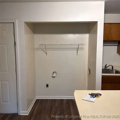 a view of wooden floor and a window
