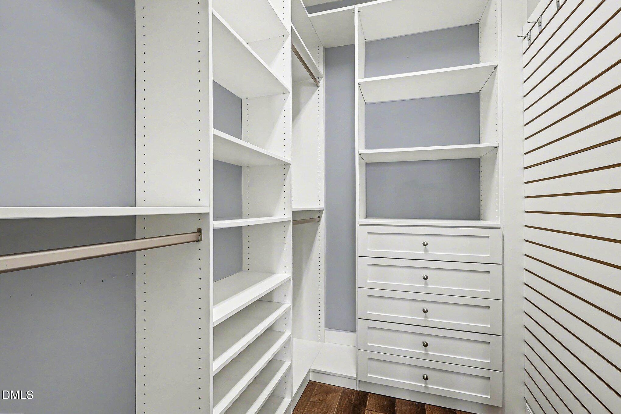 653 Fallon Grove Way Raleigh, NC 27608 - Photo 18 of 38 a view of walk in closet
