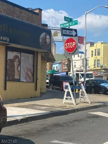 a view of a store with a table and chairs