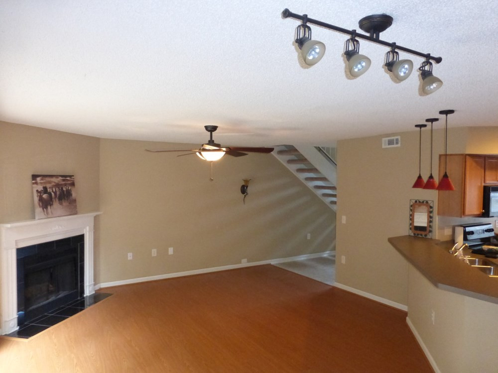 7771 Falcon Rest Circle, Unit 7771 Raleigh, NC 27615 - Photo 18 of 29 Living Room with FP