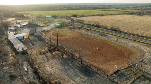an aerial view of residential house with outdoor space