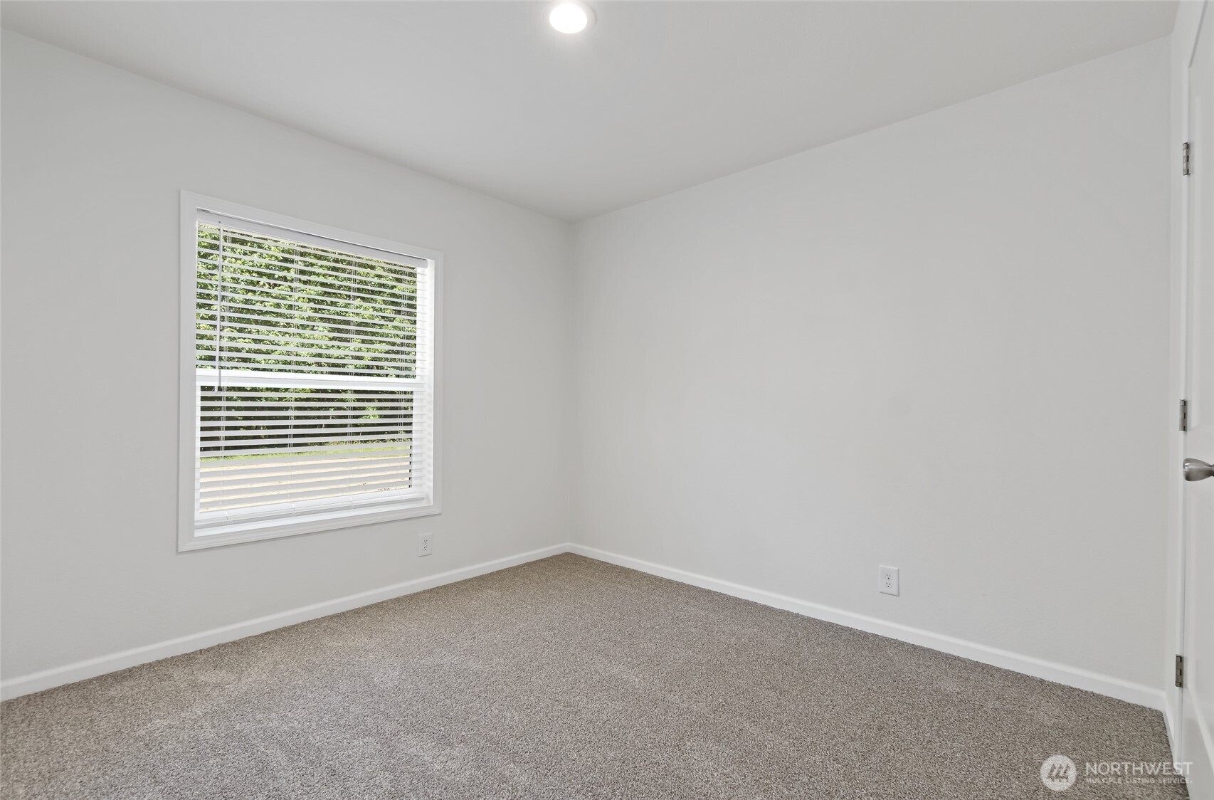 17217 80th Street Southwest Longbranch, WA 98351 - Photo 23 of 39 an empty room with a window