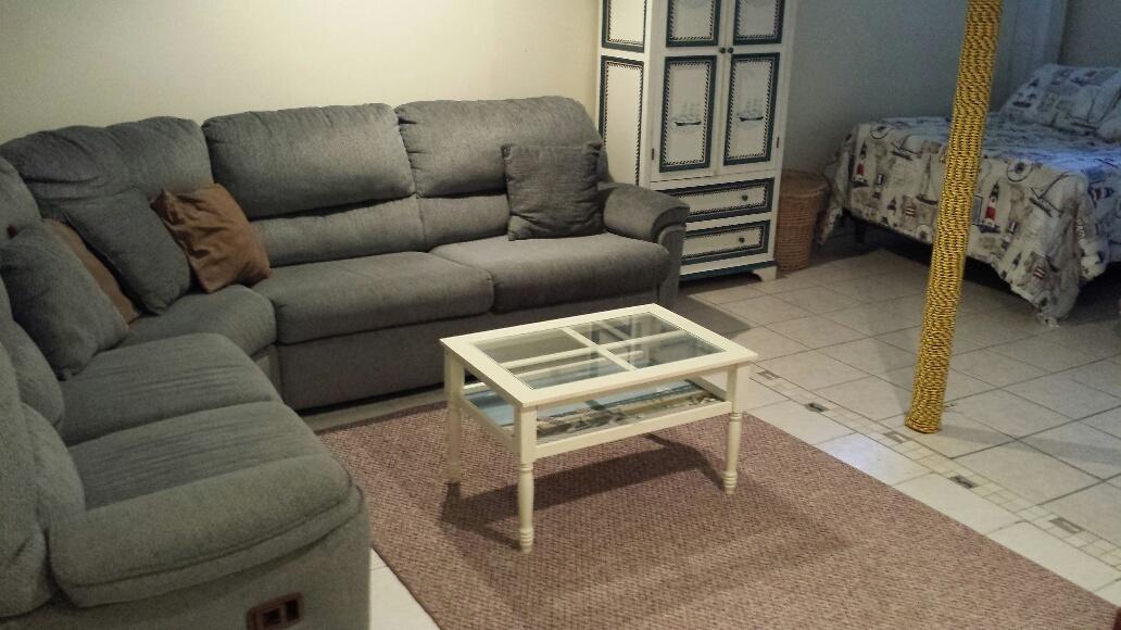 70 Beaten Road Dennis Port, MA 02639 - Photo 12 of 14 a living room with furniture a couch and kitchen view