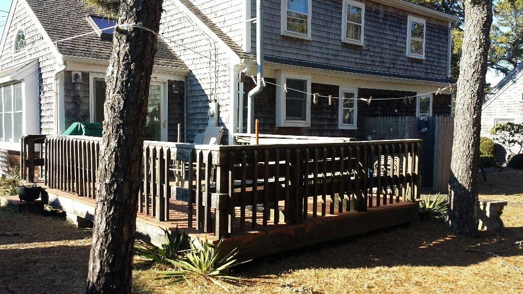 70 Beaten Road Dennis Port, MA 02639 - Photo 14 of 14 a view of a house with a porch