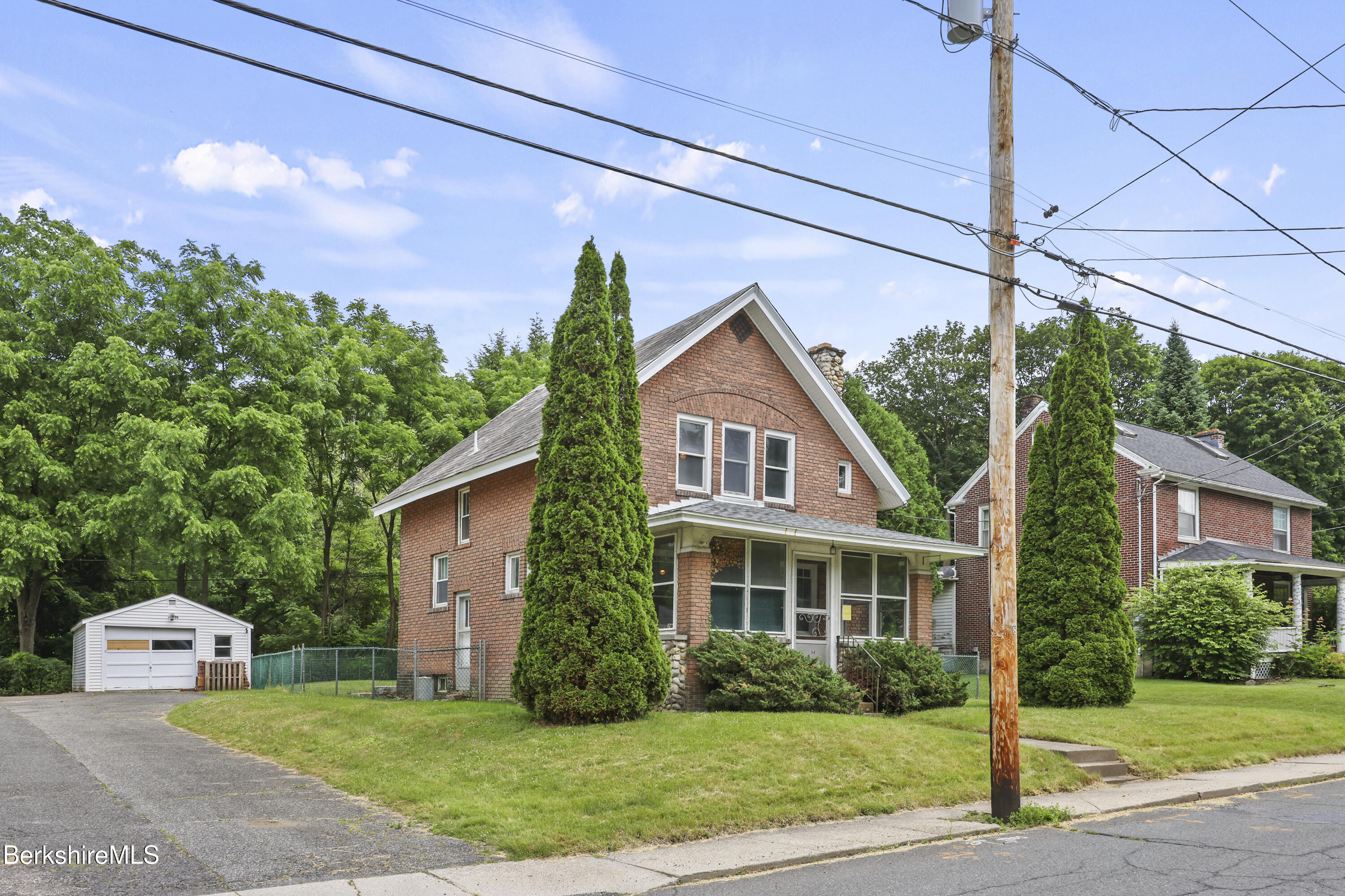 84 Notch Road North Adams, MA 01247 - Photo 2 of 30 a front view of a house with garden