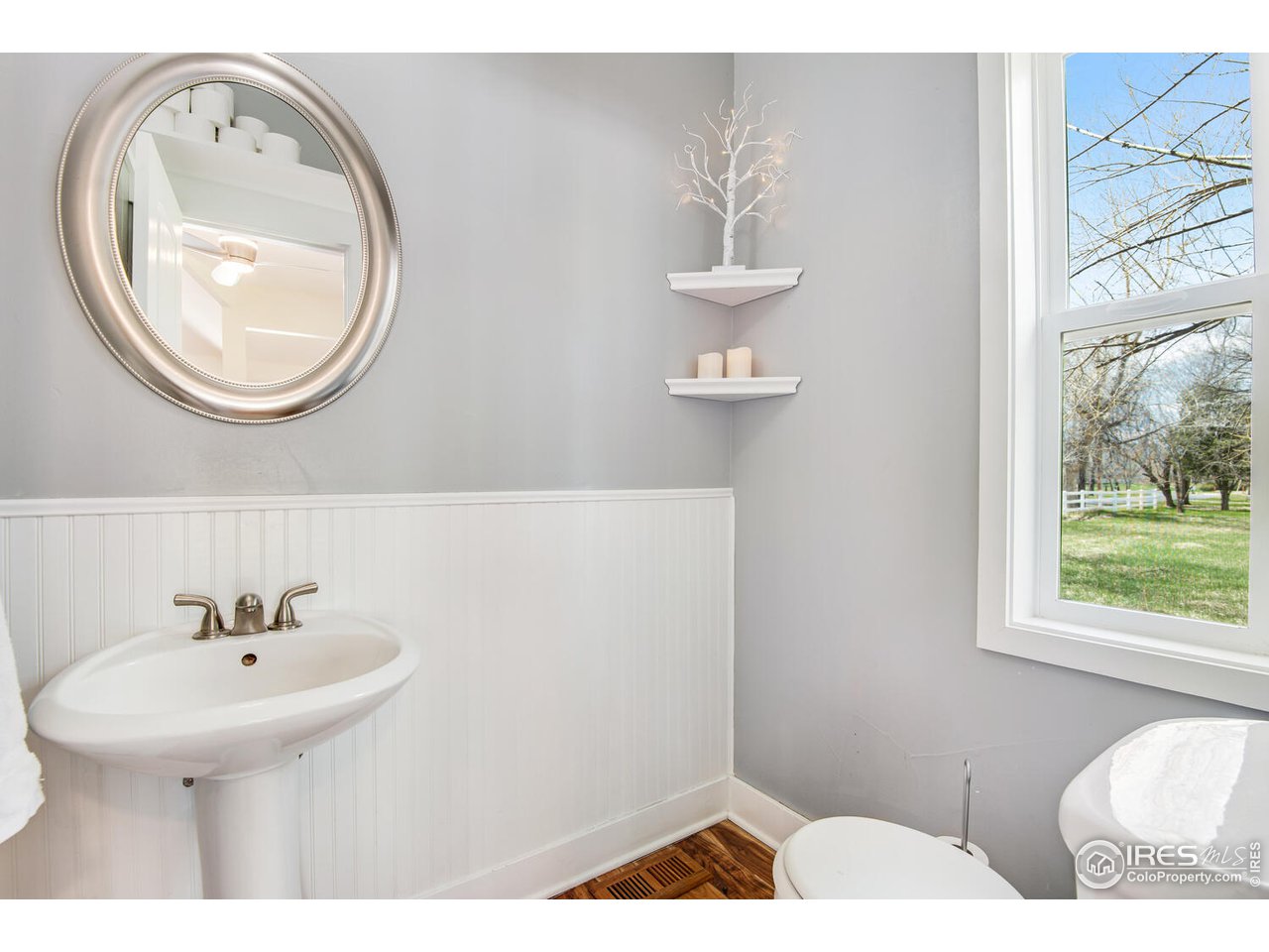 6003 Indian Road Boulder, CO 80301 - Photo 17 of 40 a bathroom with a sink and a mirror