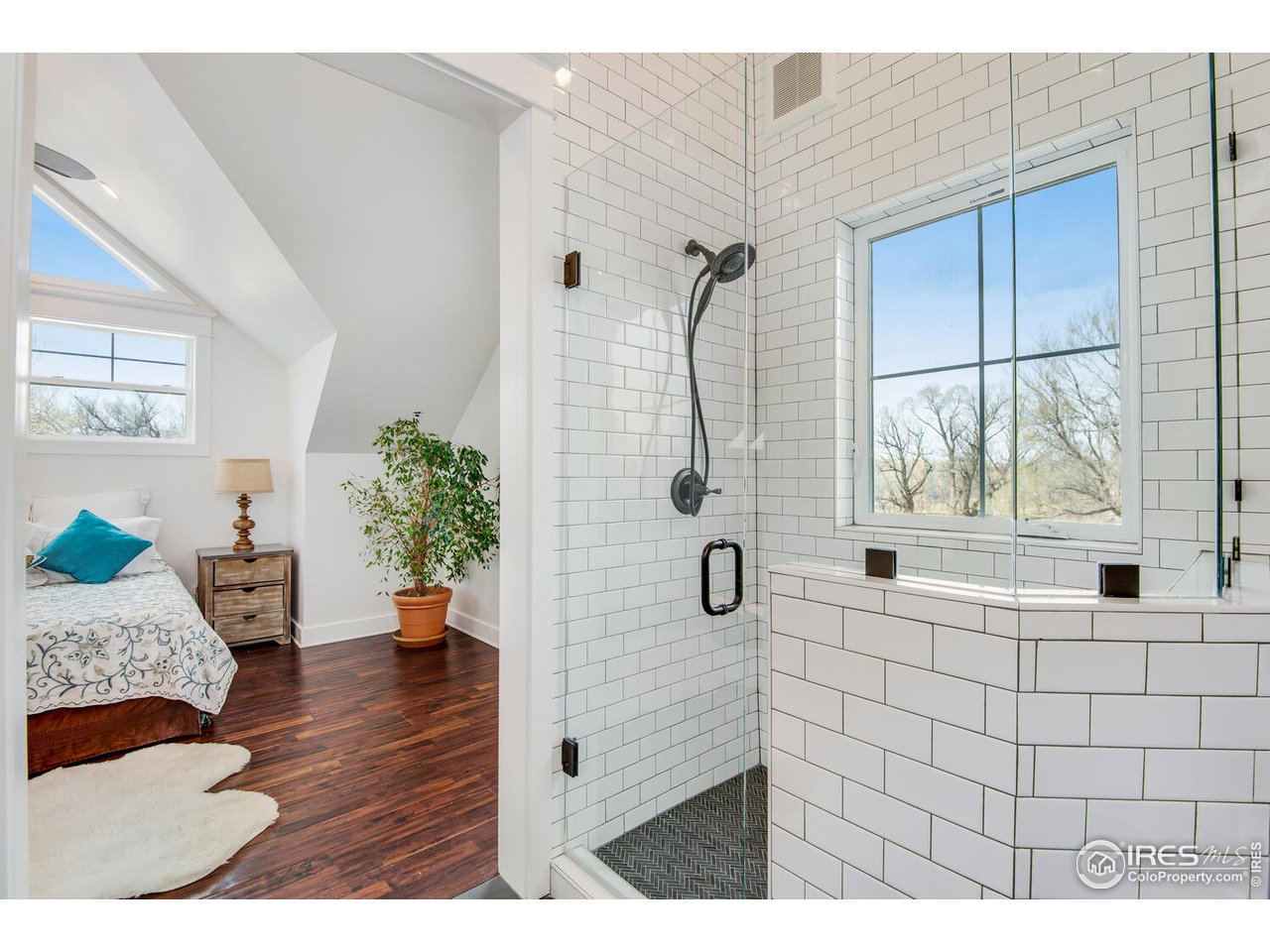 6003 Indian Road Boulder, CO 80301 - Photo 20 of 40 a bathroom with a bathtub and shower