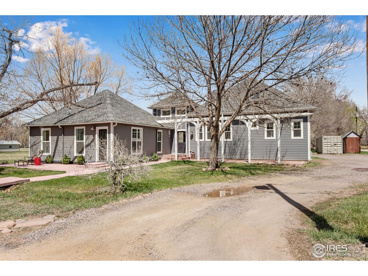 6003 Indian Road Boulder, CO 80301 - Photo 2 of 40 a front view of a house with a yard