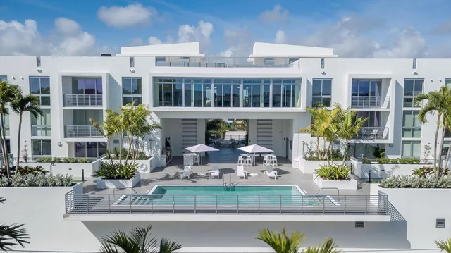 a view of house with outdoor seating