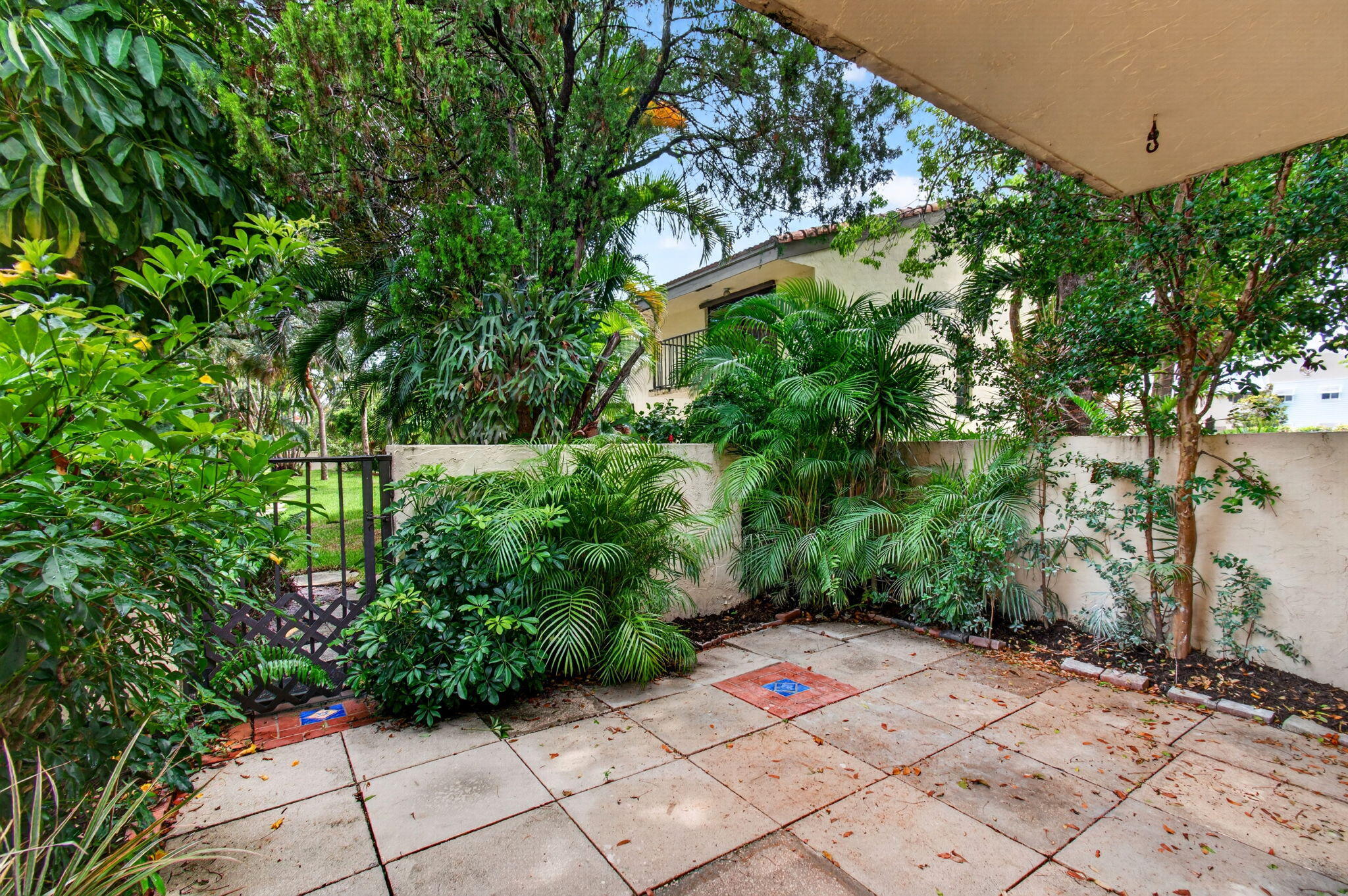 1330 Northwest 13th Street, Unit 12 Boca Raton, FL 33486 - Photo 44 of 52 a view of backyard with small pool