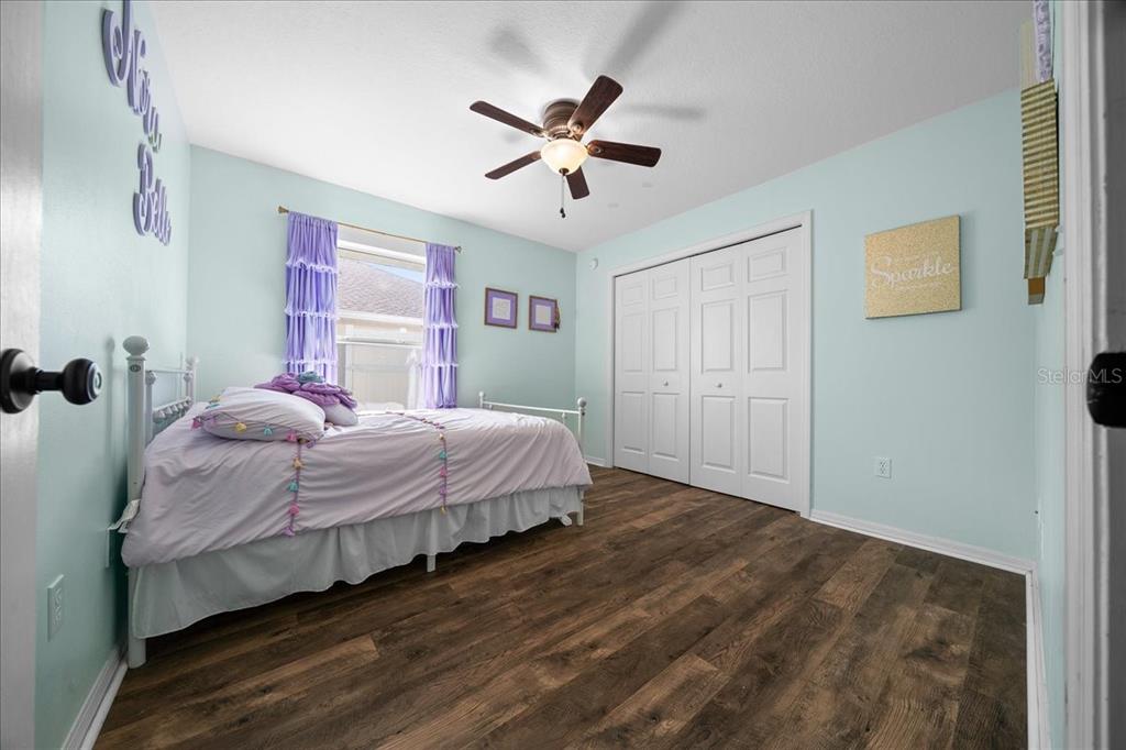 10080 Southeast 69th Terrace Belleview, FL 34420 - Photo 31 of 51 a bedroom with a bed and window