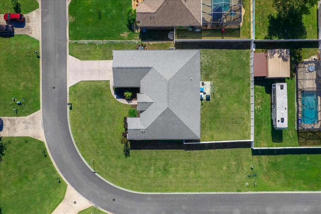 10080 Southeast 69th Terrace Belleview, FL 34420 - Photo 50 of 51 an aerial view of a house with swimming pool garden and patio
