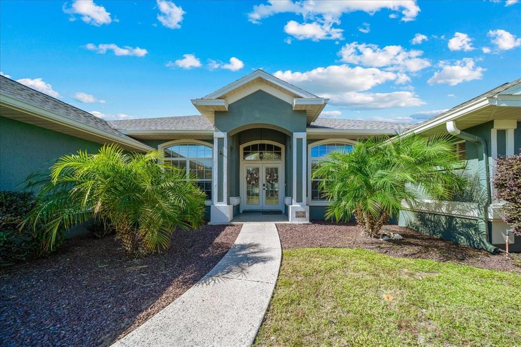 10080 Southeast 69th Terrace Belleview, FL 34420 - Photo 5 of 51 a view of a garden with an outdoor space