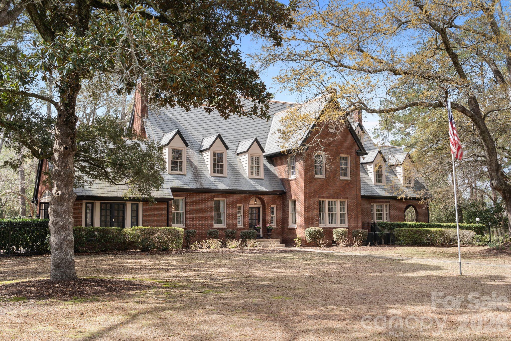 1503 Elm Street Conway, SC 29526 - Photo 1 of 48 a front view of a building with a yard