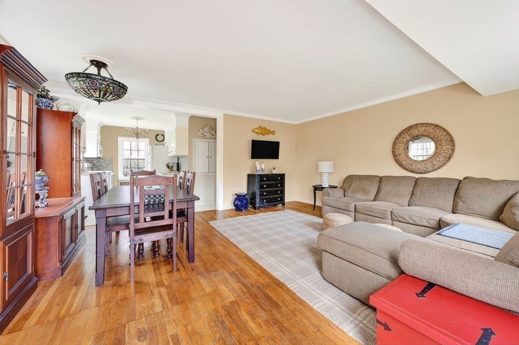 15 Leigh Road Norwell, MA 02061 - Photo 5 of 34 a living room with furniture and a fireplace