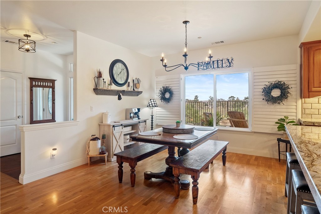 10844 Vista Atascadero Ca Atascadero, CA 93422 - Photo 13 of 74 a view of a dining room with furniture window and wooden floor