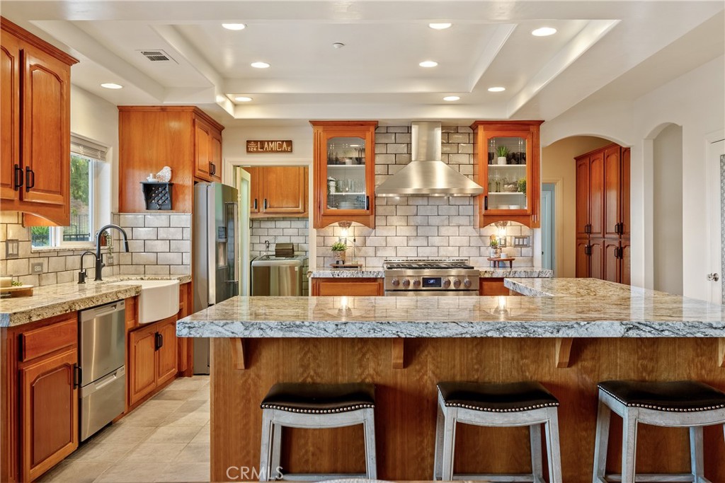 10844 Vista Atascadero Ca Atascadero, CA 93422 - Photo 16 of 74 Entering the kitchen you'll notice the large island. It has space for seating and serving.