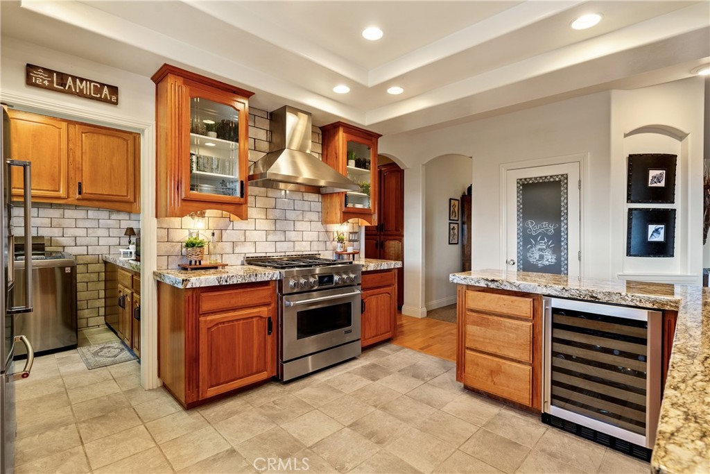 10844 Vista Atascadero Ca Atascadero, CA 93422 - Photo 17 of 74 a kitchen with stainless steel appliances granite countertop a stove and more cabinets