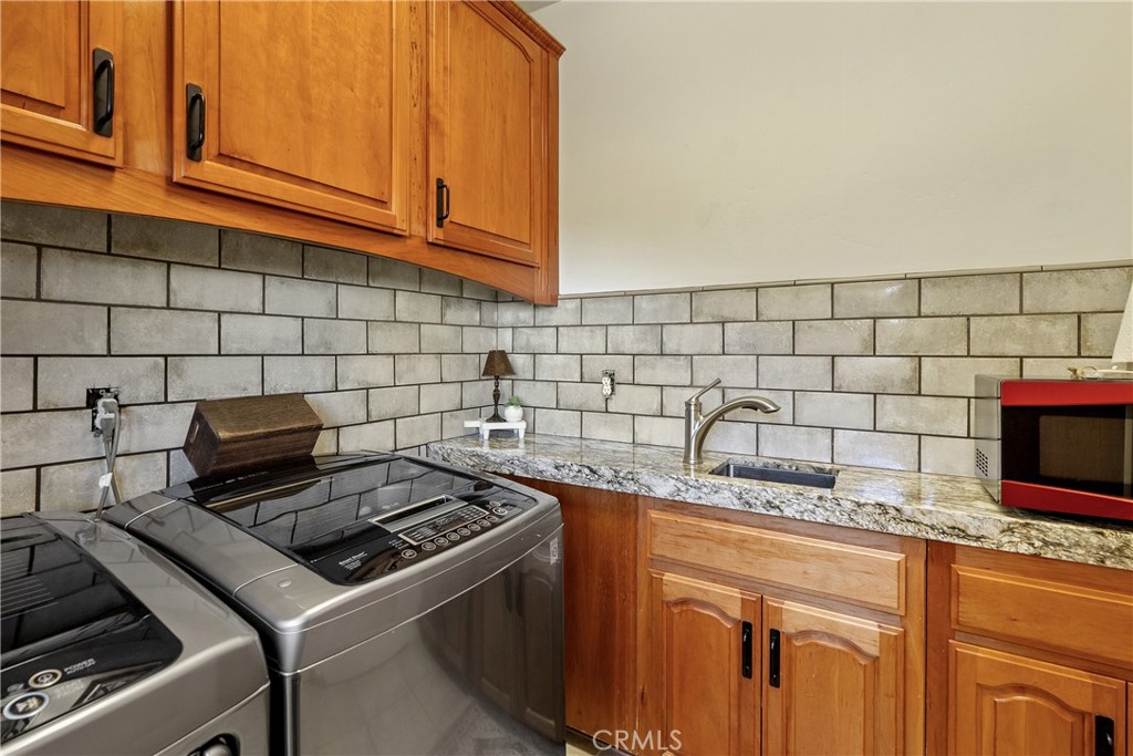 10844 Vista Atascadero Ca Atascadero, CA 93422 - Photo 20 of 74 a kitchen with a stove and a sink
