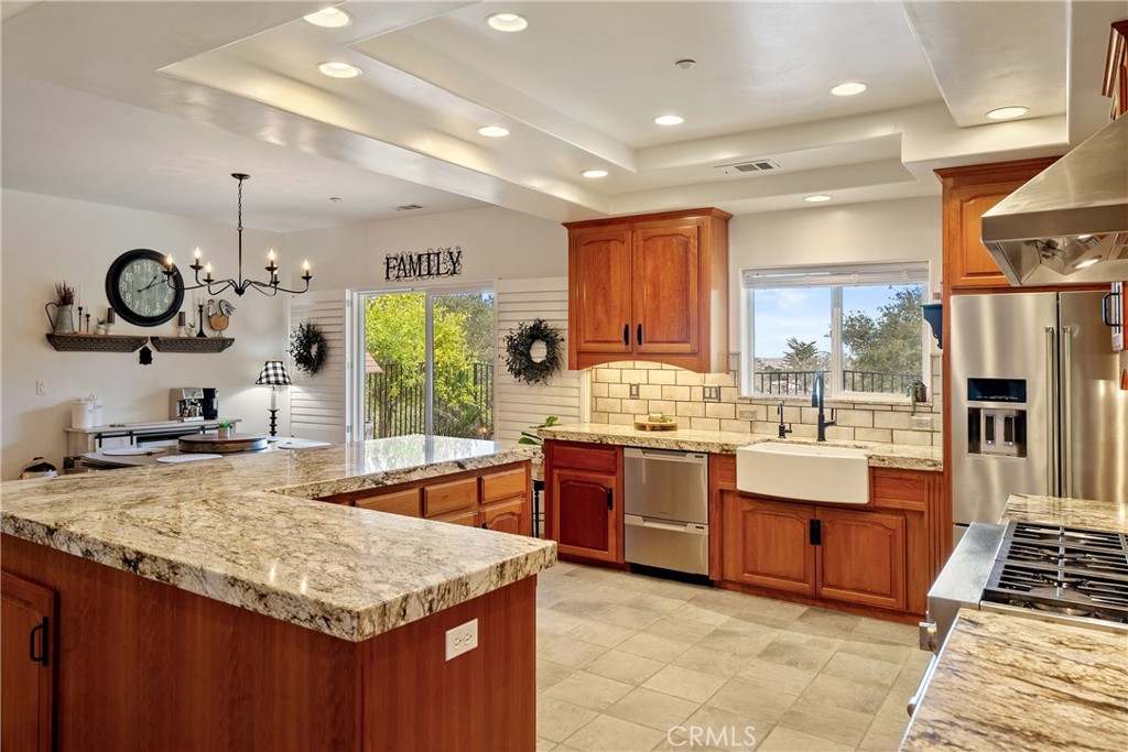 10844 Vista Atascadero Ca Atascadero, CA 93422 - Photo 22 of 74 a kitchen with stainless steel appliances granite countertop a sink stove and refrigerator