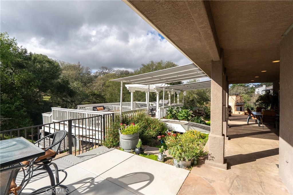 10844 Vista Atascadero Ca Atascadero, CA 93422 - Photo 27 of 74 a view of a patio with table and chairs and potted plants