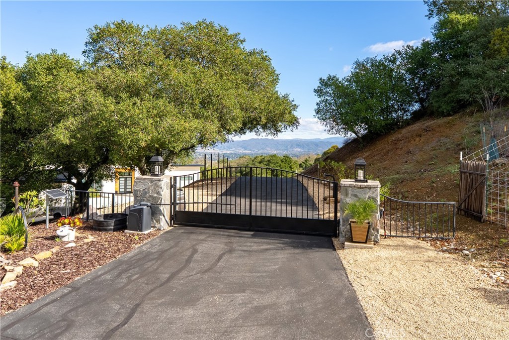 10844 Vista Atascadero Ca Atascadero, CA 93422 - Photo 41 of 74 a view of a backyard with a sitting area