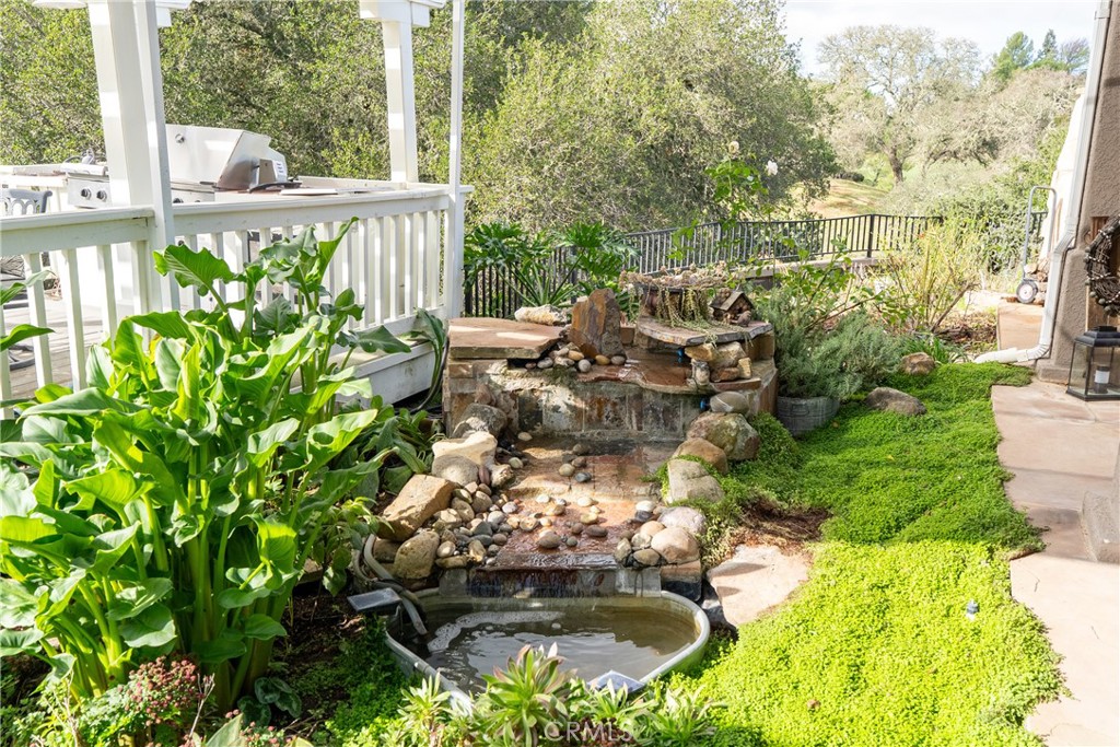 10844 Vista Atascadero Ca Atascadero, CA 93422 - Photo 55 of 74 Unwind in the backyard with the tranquil sounds of a custom waterfall feature.