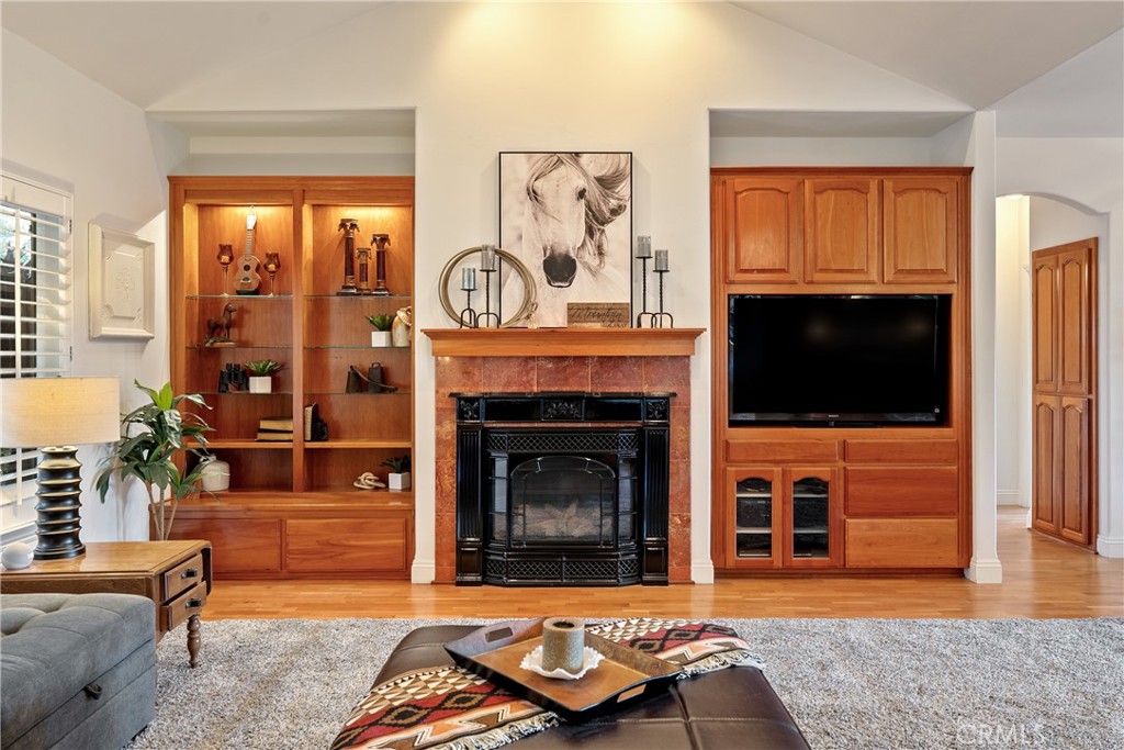 10844 Vista Atascadero Ca Atascadero, CA 93422 - Photo 10 of 74 a living room with furniture a flat screen tv and a fireplace