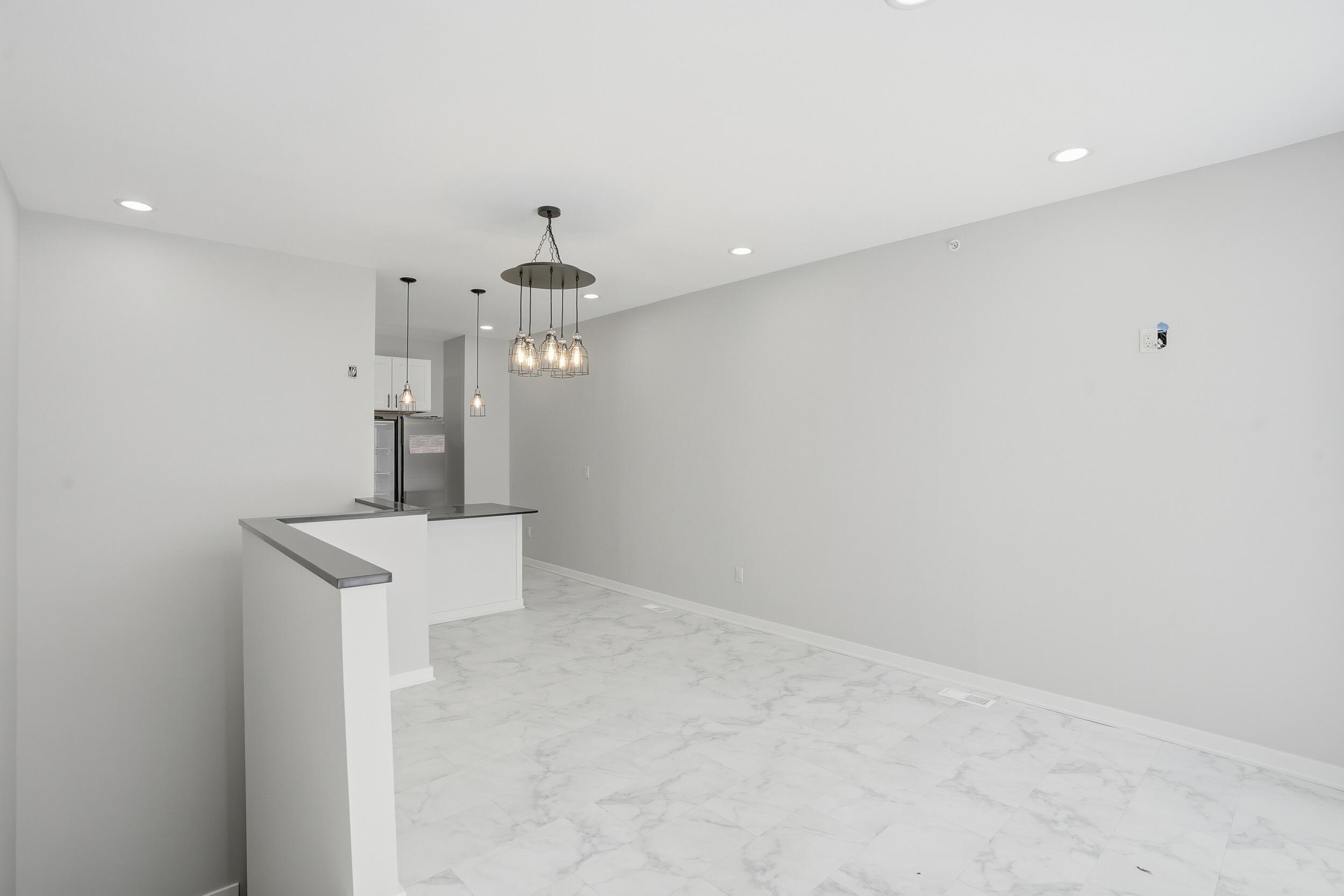 1540 119th Street, Unit 201 Whiting, IN 46394 - Photo 7 of 17 a kitchen with stainless steel appliances a sink and a stove