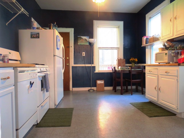 802 West Altgeld Street Chicago, IL 60614 - Photo 5 of 18 a kitchen with cabinets and wooden floor