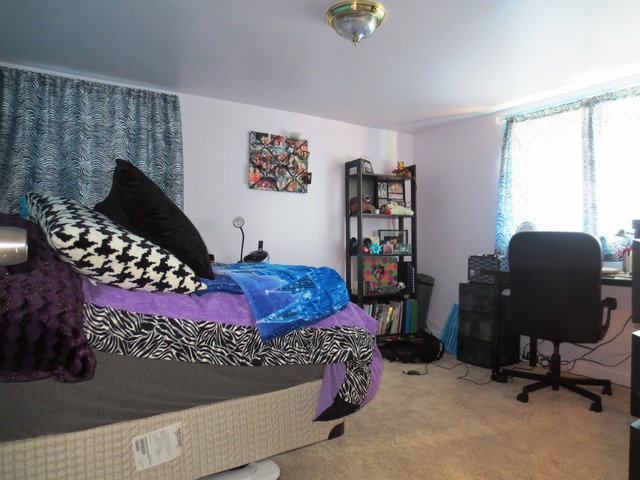 802 West Altgeld Street Chicago, IL 60614 - Photo 8 of 18 a bedroom with a bed and a window
