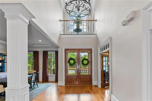 a dining room with furniture and a window