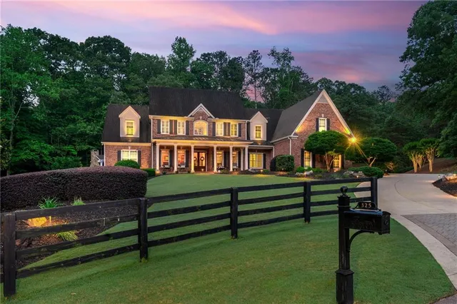 a view of house with outdoor seating
