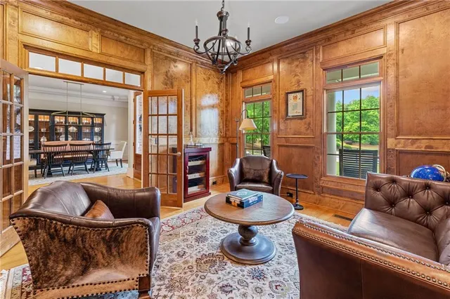 a bath tub sitting next to a bathroom sink