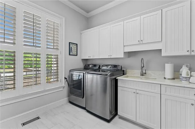 a view of swimming pool with outdoor seating and plants