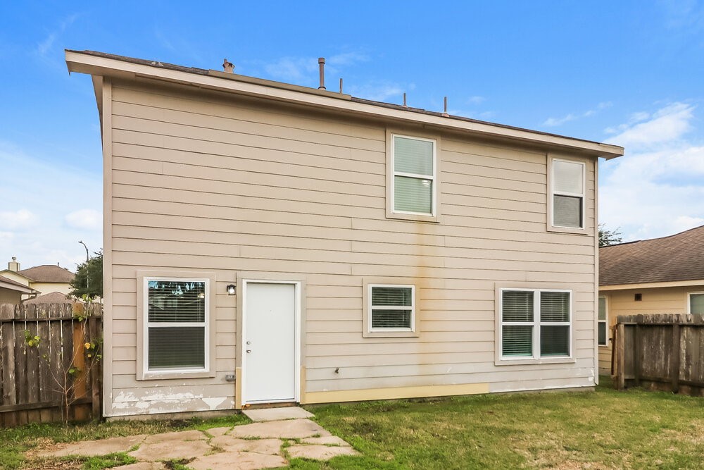 13214 Montclair Point Court Houston, TX 77047 - Photo 17 of 17 a view of a house with a yard