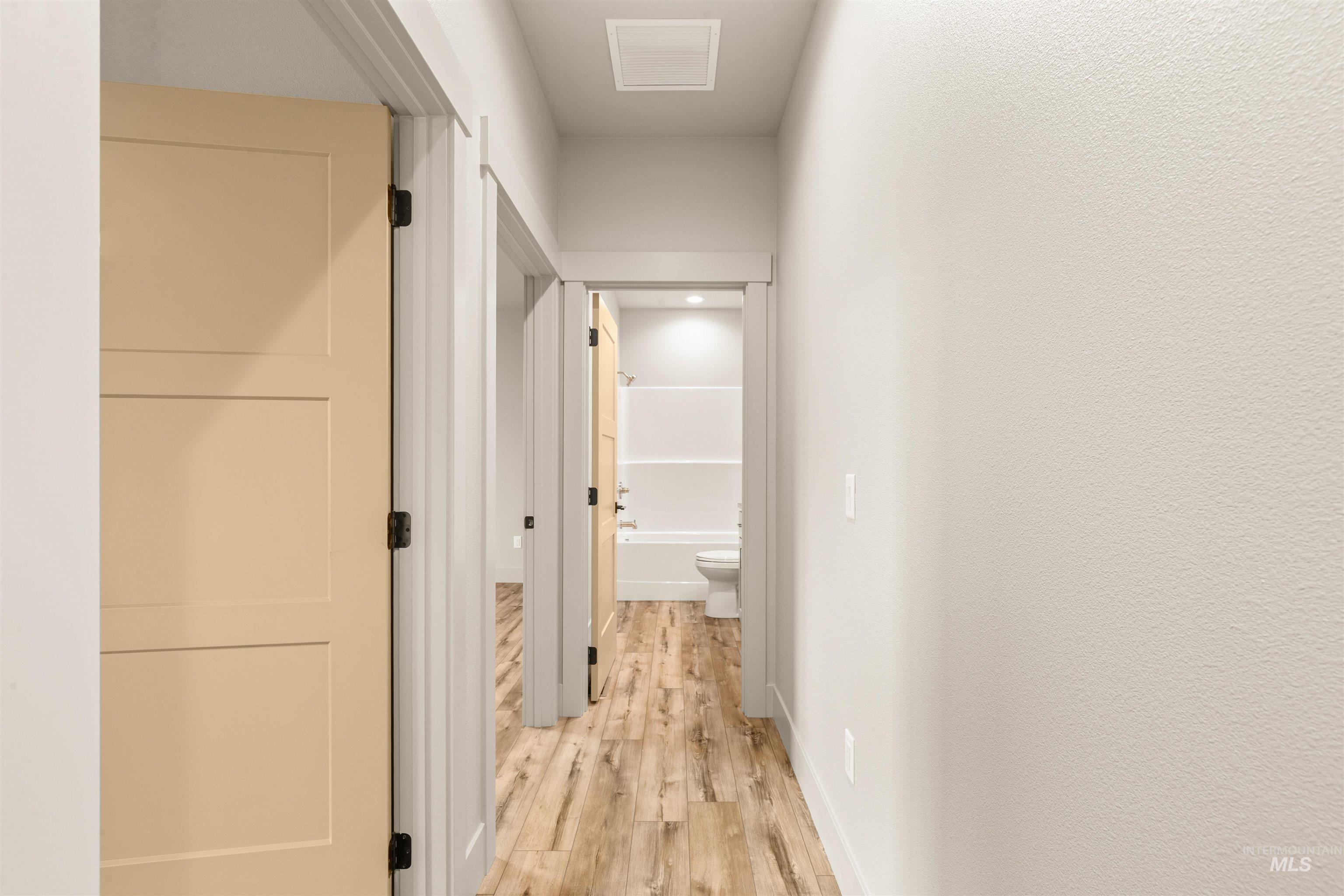 335 Warner Avenue Lewiston, ID 83501 - Photo 22 of 43 Hall with light wood-type flooring and baseboards