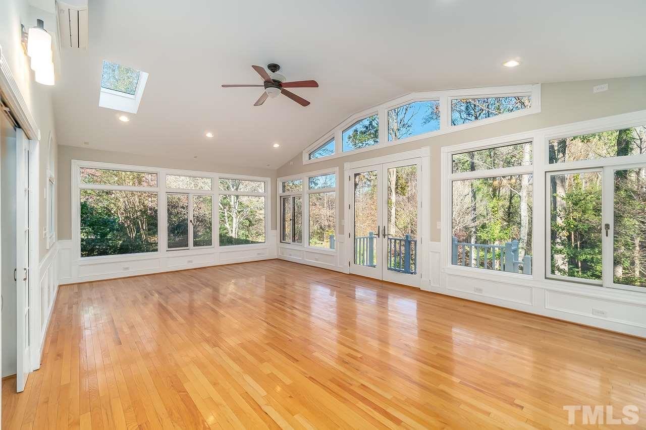3908 Westwood Place Raleigh, NC 27613 - Photo 11 of 30 Wonderful sunroom overlooking nicely landscaped backyard