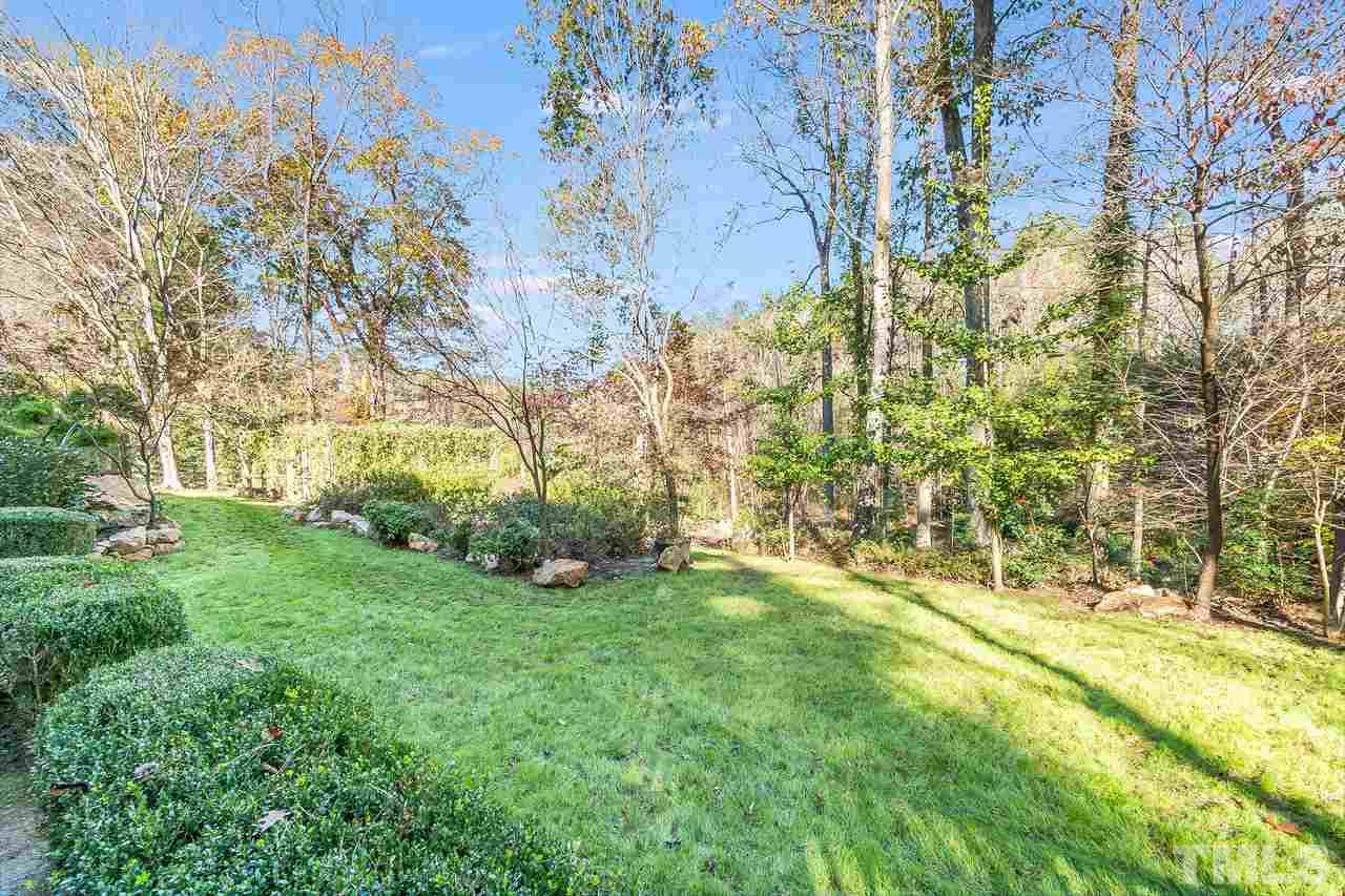 3908 Westwood Place Raleigh, NC 27613 - Photo 29 of 30 Beautifully landscaped backyard