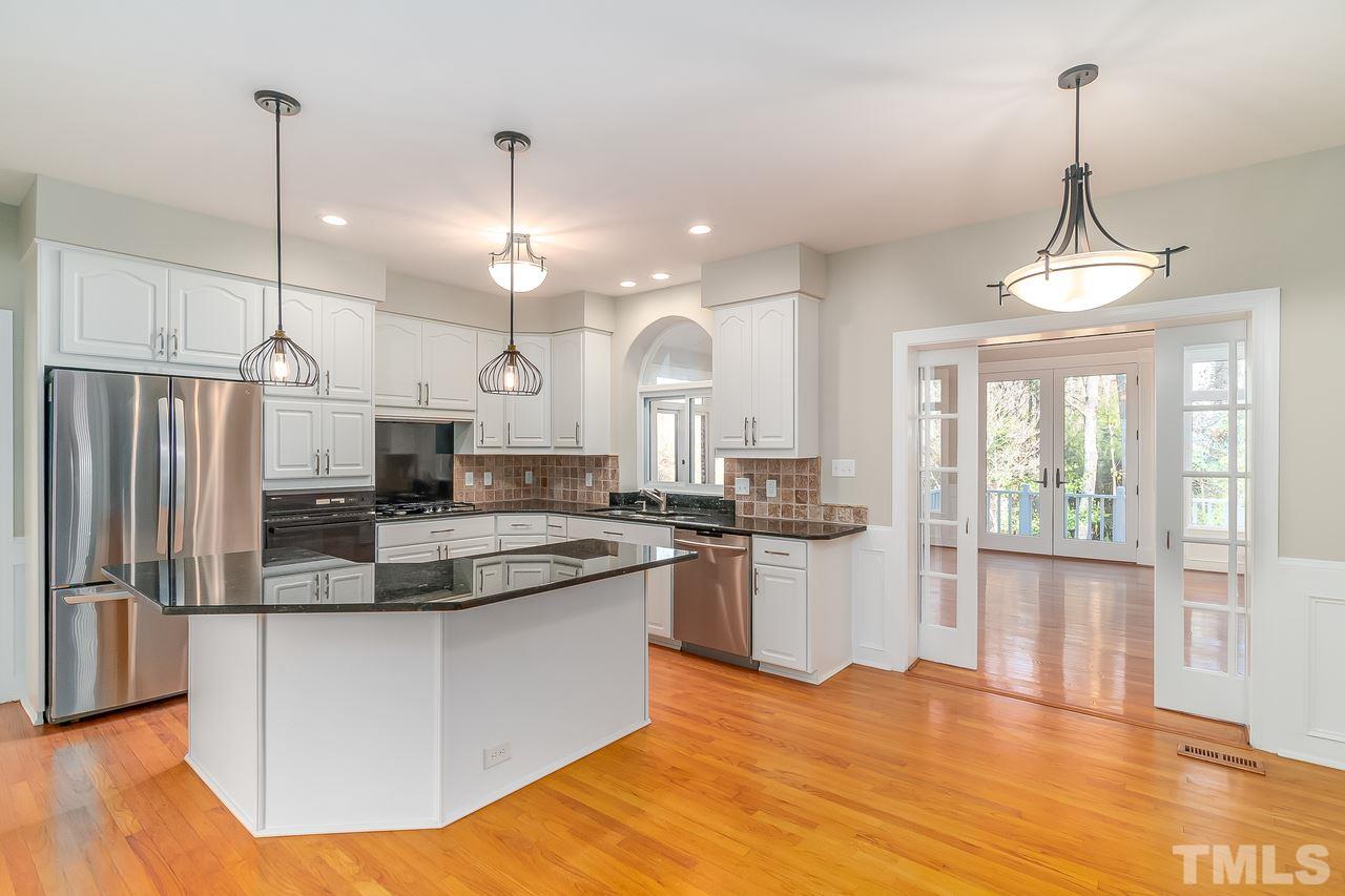 3908 Westwood Place Raleigh, NC 27613 - Photo 9 of 30 Large bright kitchen