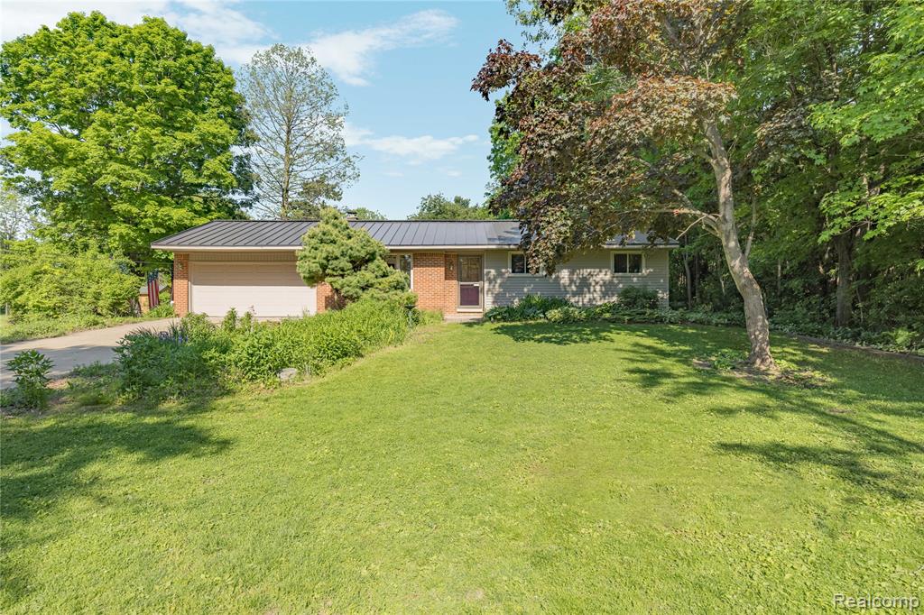 760 Waterbury Road Highland, MI 48356 - Photo 4 of 62