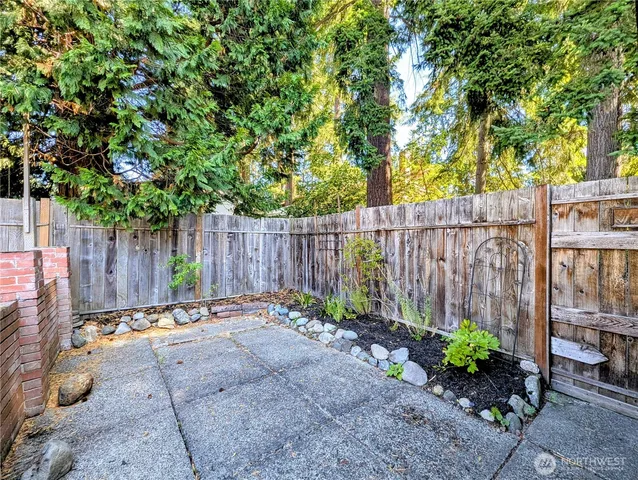 a backyard of a house with a garden