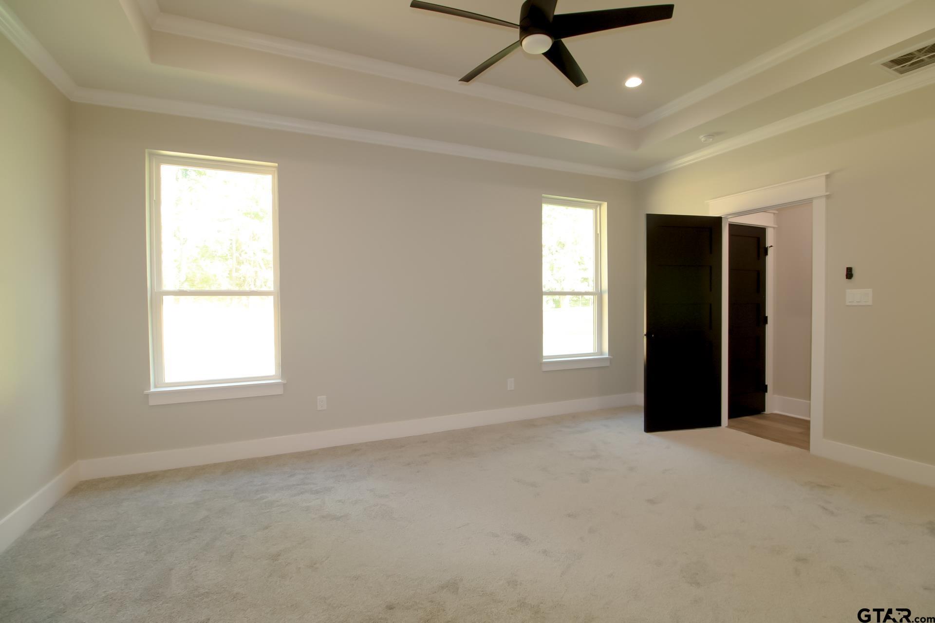 1069 Stagecoach Bend Bullard, TX 75757 - Photo 19 of 44 a view of an empty room with a window