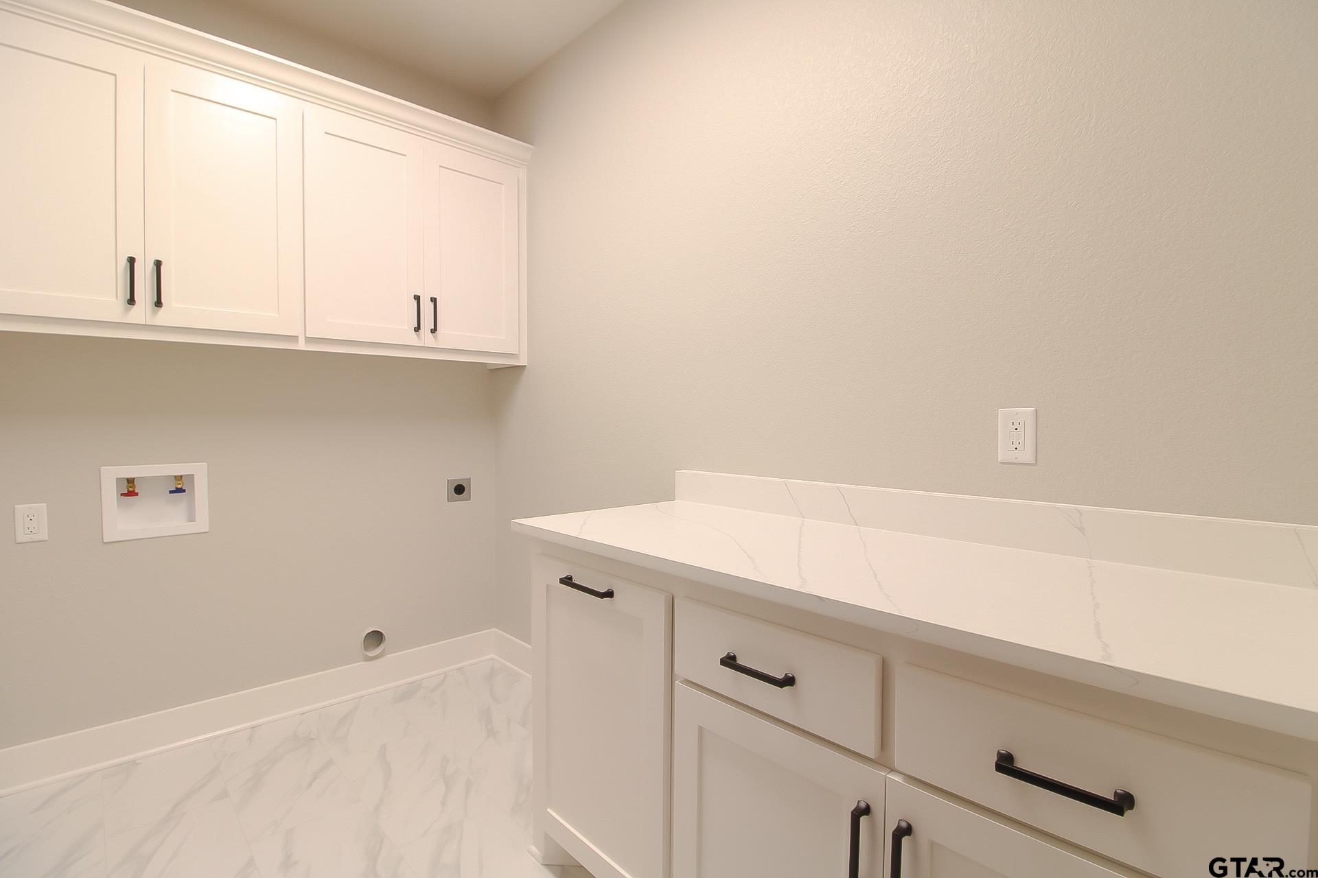 1069 Stagecoach Bend Bullard, TX 75757 - Photo 38 of 44 a view of a kitchen with cabinets