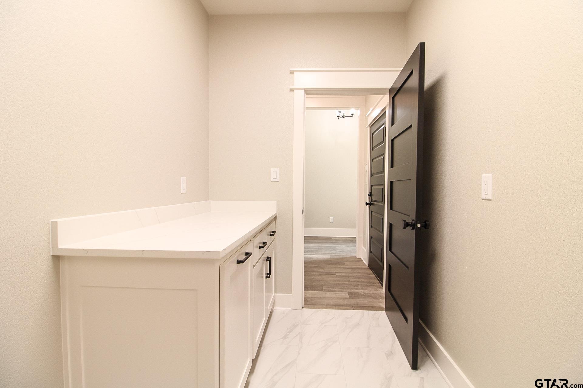 1069 Stagecoach Bend Bullard, TX 75757 - Photo 39 of 44 a bathroom with a sink and a mirror