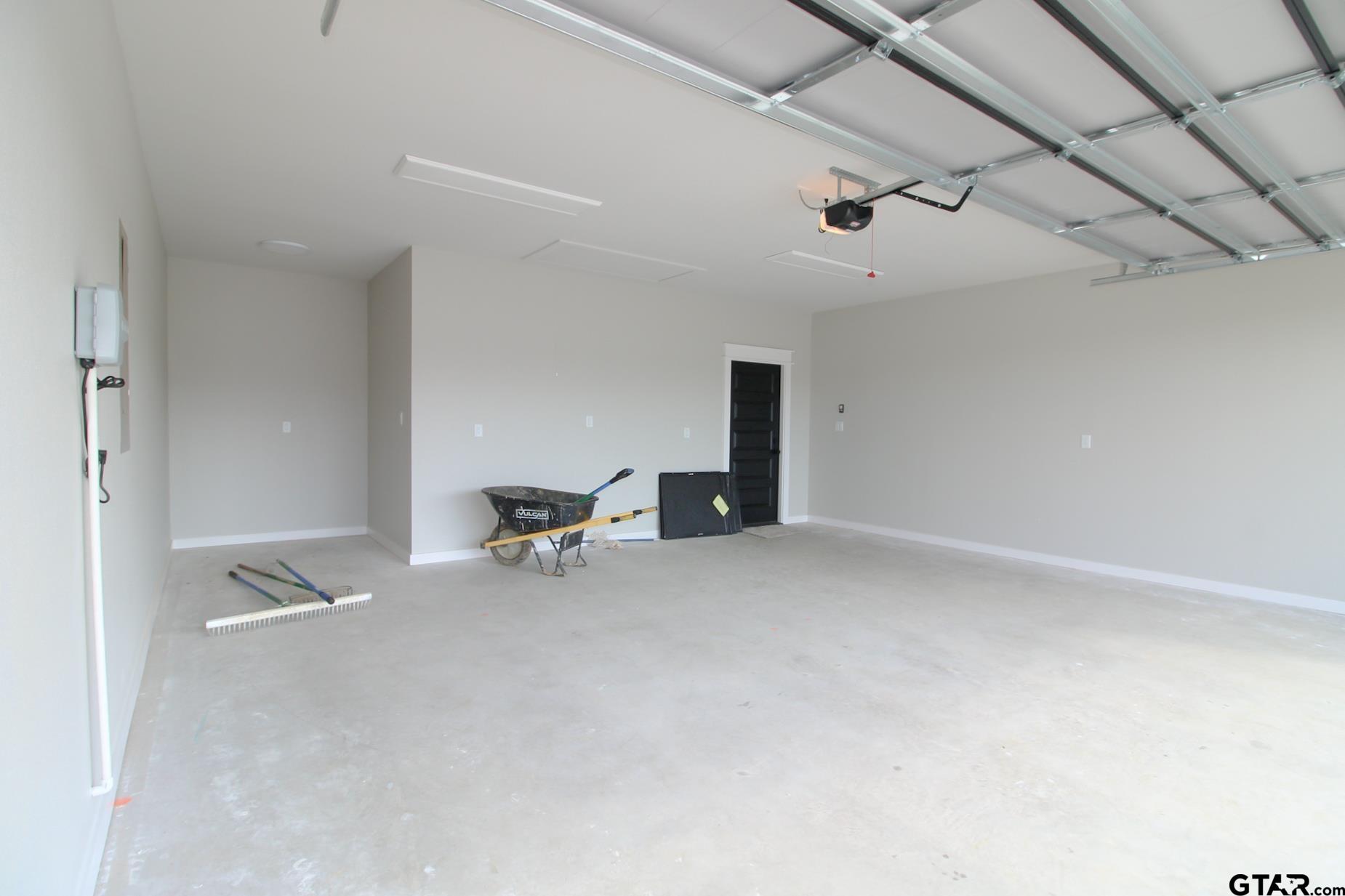 1069 Stagecoach Bend Bullard, TX 75757 - Photo 41 of 44 an empty room with furniture and windows