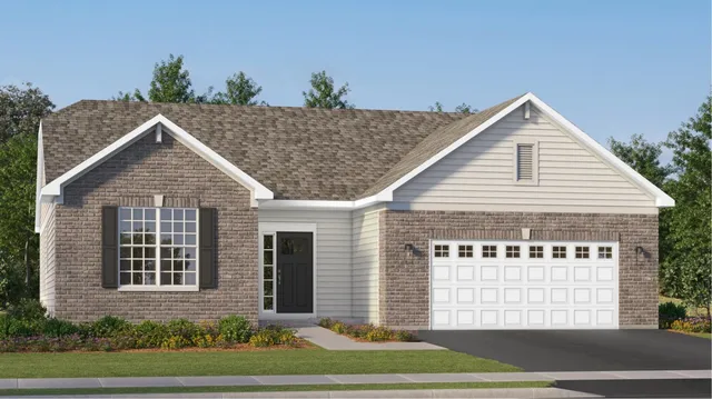 a view of a house with a yard and garage
