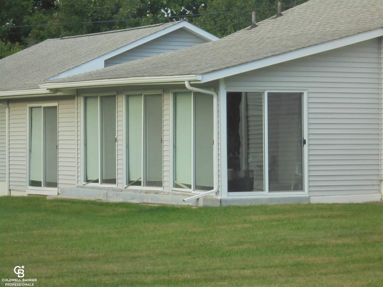 4740 Howland Road Almont, MI 48003 - Photo 10 of 51 Enclosed Rear Porch