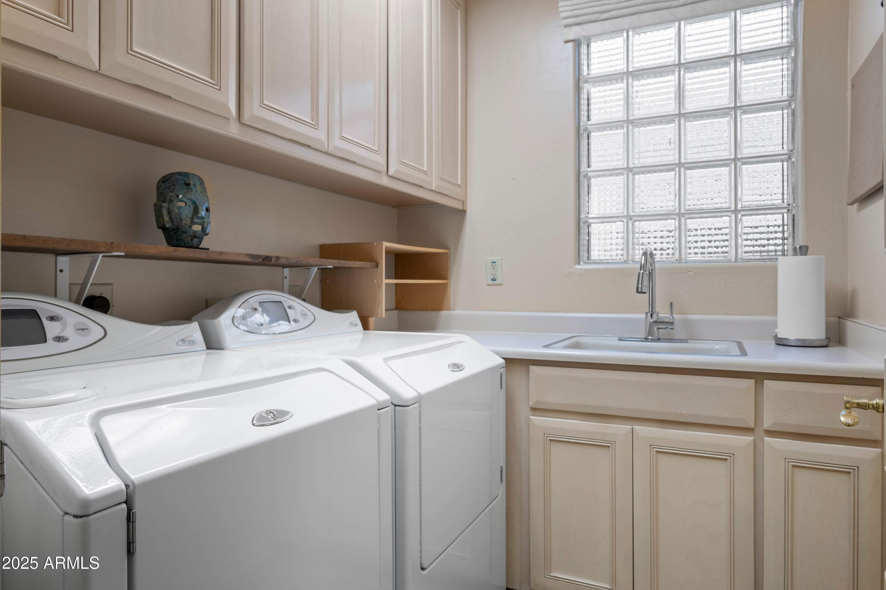 7425 East Gainey Ranch Road, Unit 13 Scottsdale, AZ 85258 - Photo 25 of 52 Laundry Room with plenty of Storage