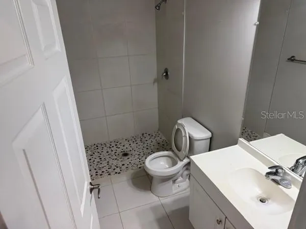 a bathroom with a sink and a toilet